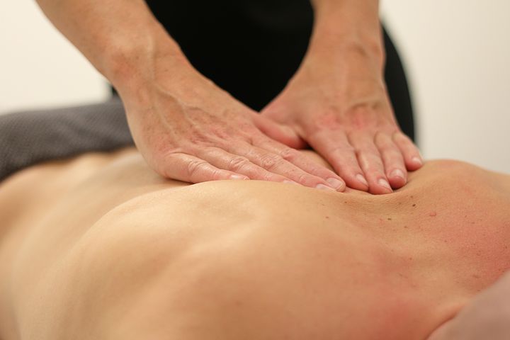 back of the patient of a Patient getting a treatment from a Norwest Chiropractor
