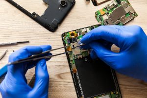 Technician servicing same day phone repair